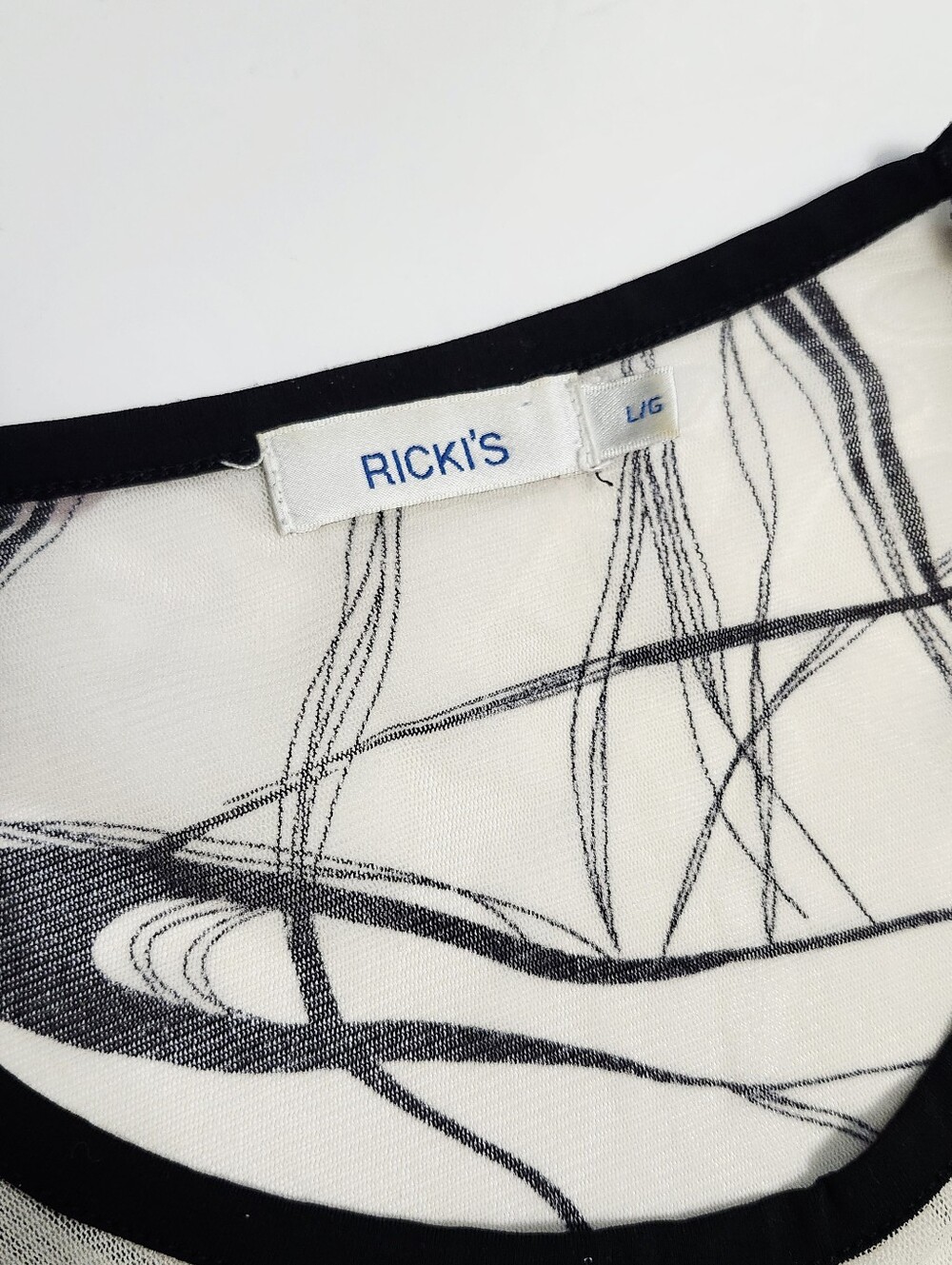 Ricki's L Abstract Floral Shirt Sleeve Top - Picture 9 of 14